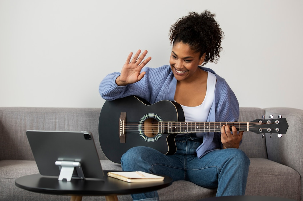 Project musica. Baby holding Guitar.